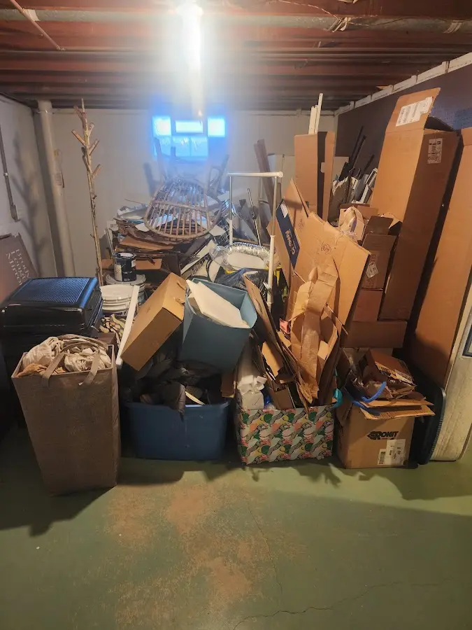 Roll-off dumpster container at job site for 4 Yard Dumpster Rental in Water Valley